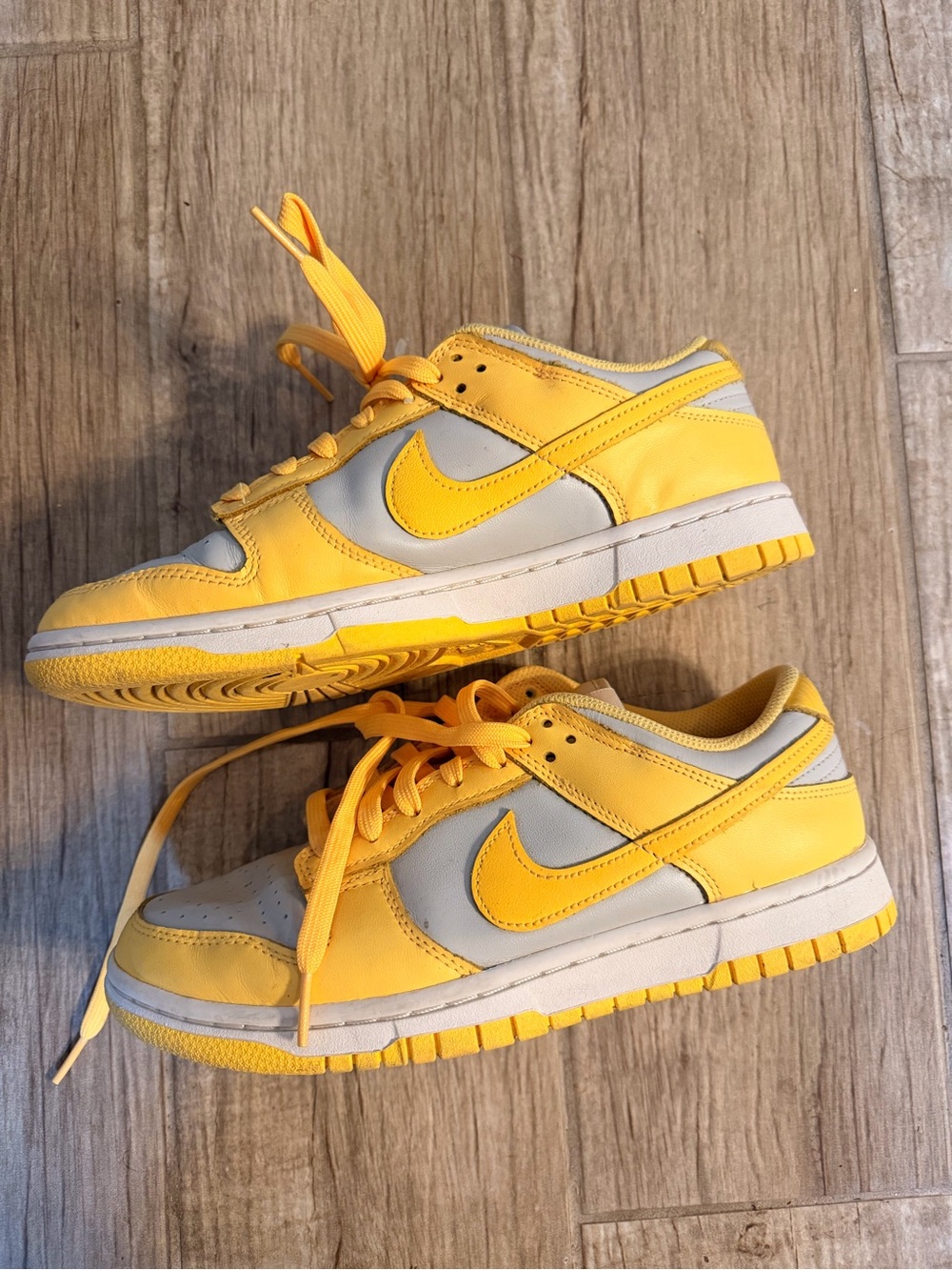 Women’s Nike Dunks—bright yellow and light gray